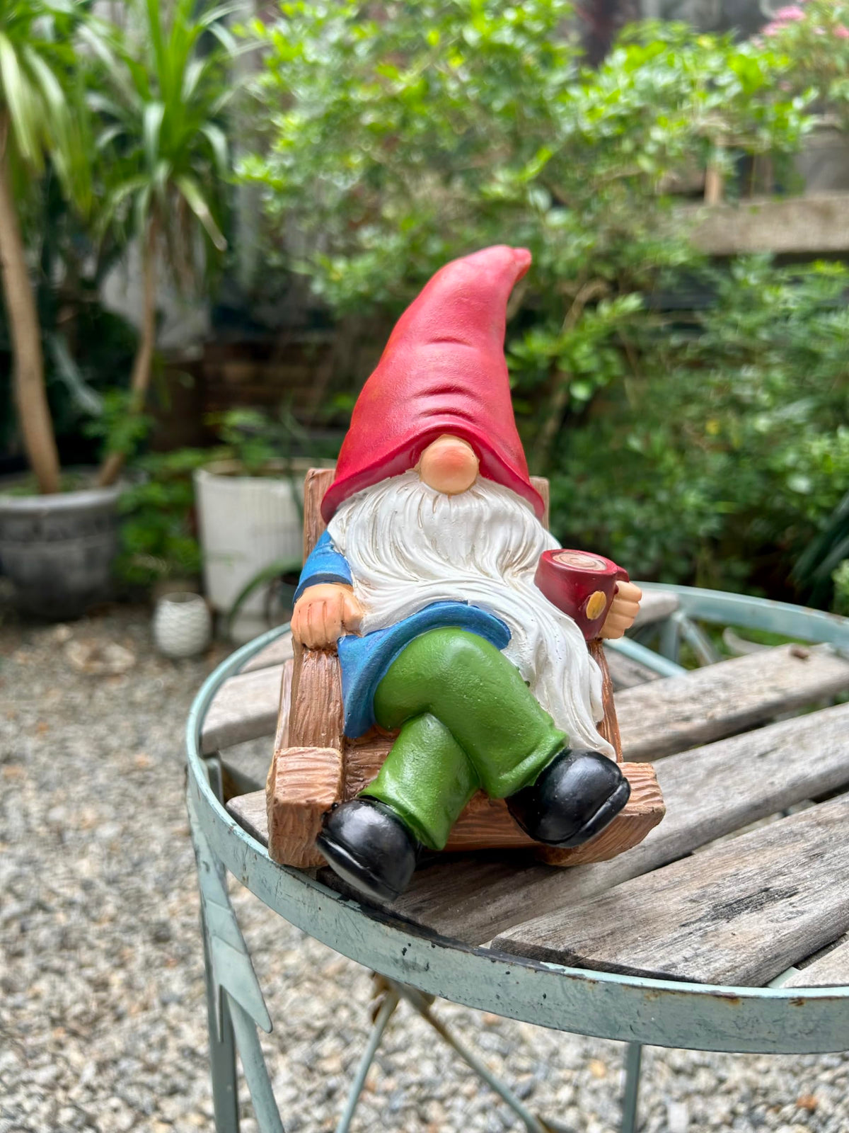 Generic coffee-loving gnome complements coffee corners and entryways.