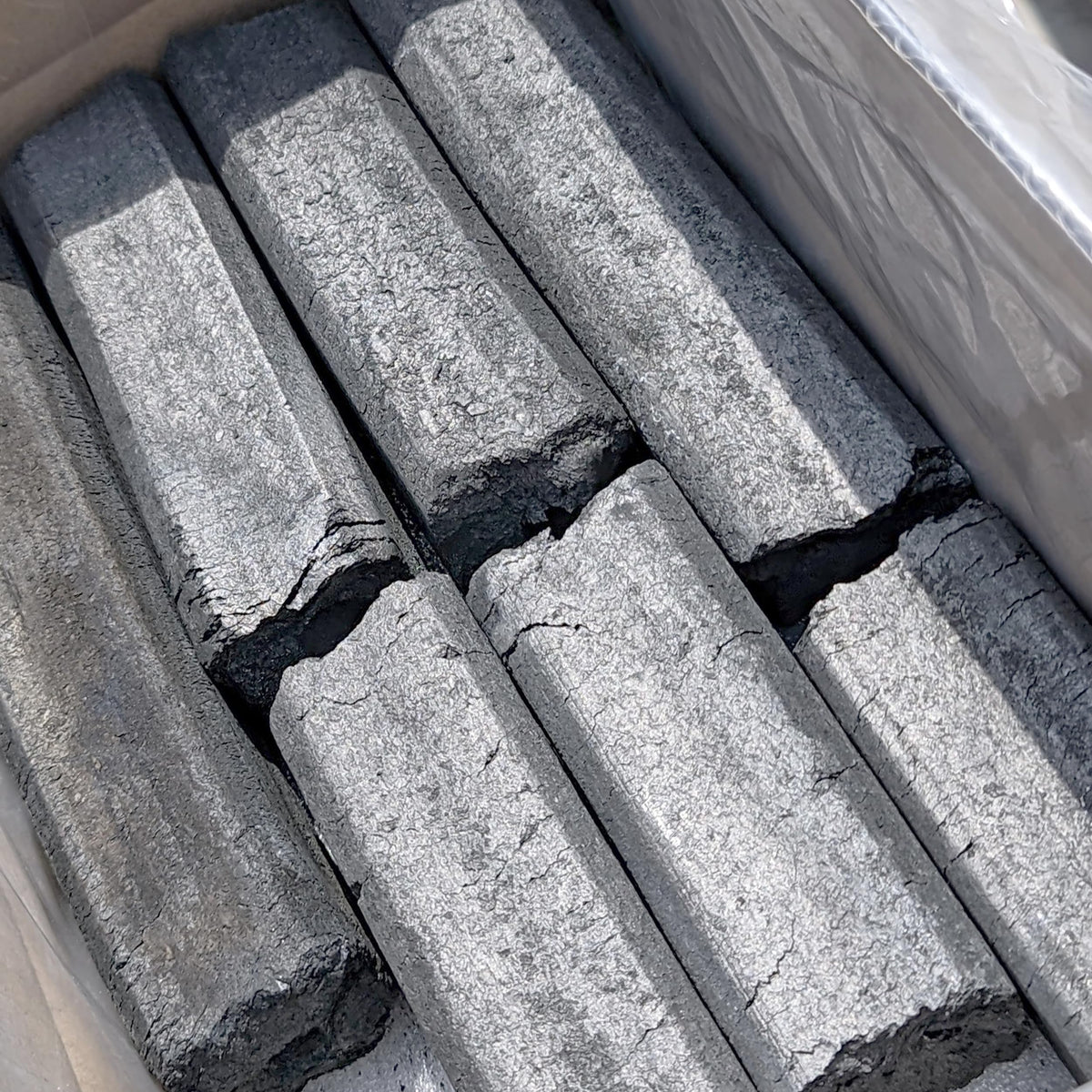 Generic extended-burn bamboo charcoal delivers longer cooking sessions.