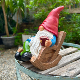 Generic faceless gnome in garden adds whimsical charm to patios.