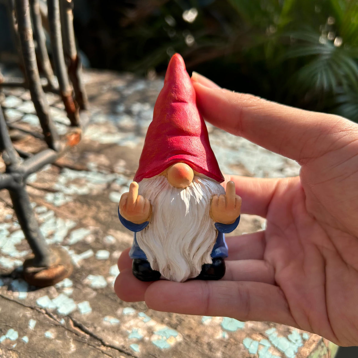 Generic Hand-Painted Gnome with detailed accents enhances whimsical home decor.