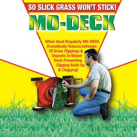 Before use, grass clipping buildup on a mower deck.