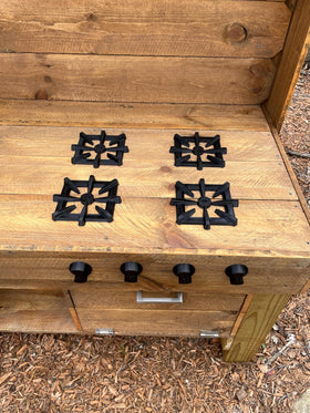 Generic Mud Kitchen Grill Knobs close-up showing secure attachment on wood surfaces.