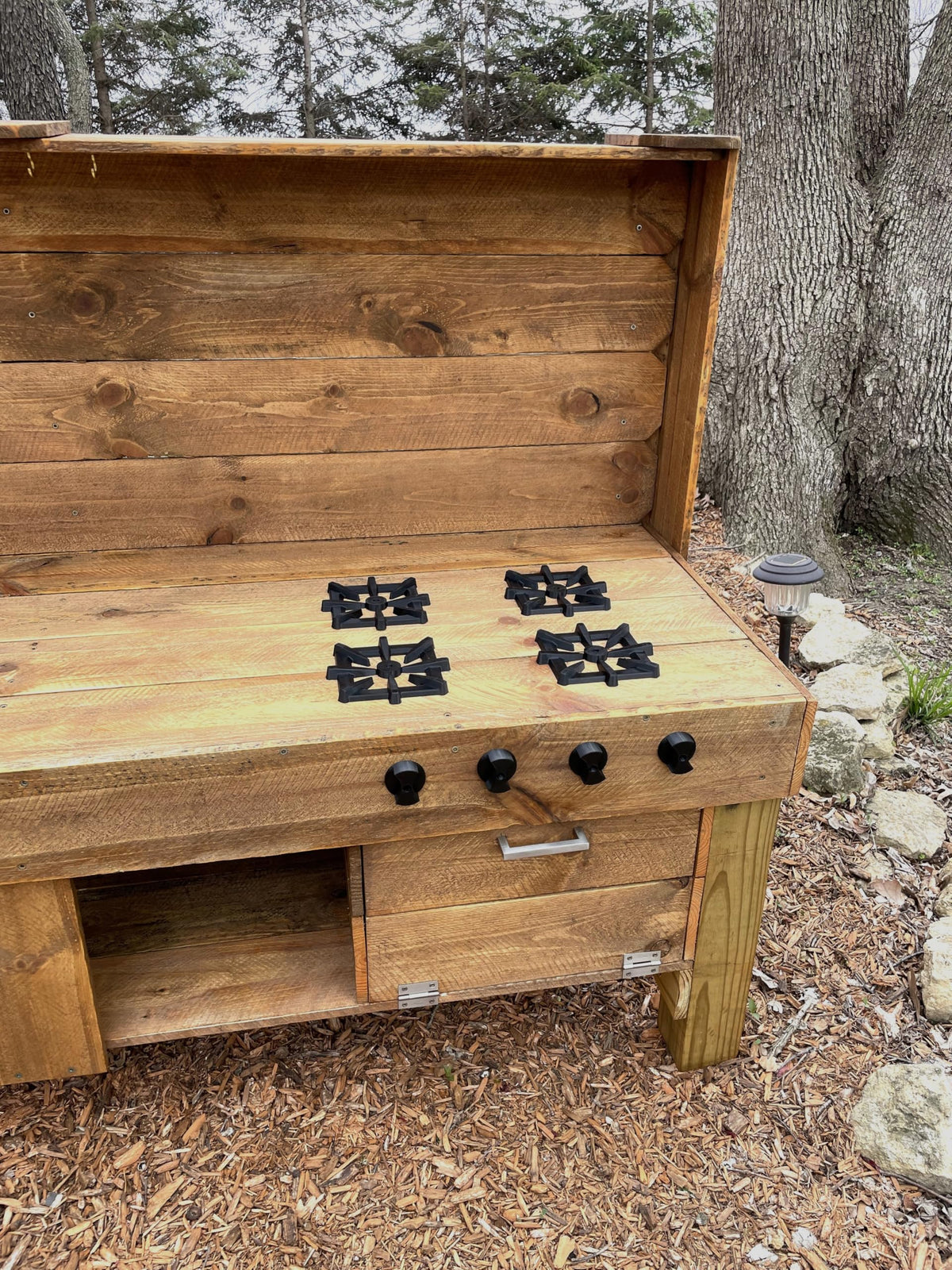 Generic Mud Kitchen outdoor play area encourages imaginative cooking.
