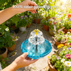 Generic solar water pump powers a quiet waterfall for birds and ambiance