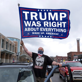 Generic Trump Was Right banner garden display on fence
