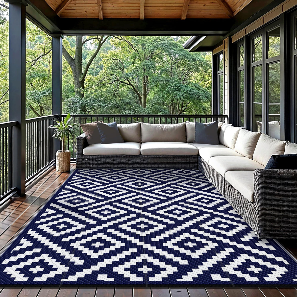 GENIMO rug showing reversible geometric surfaces in navy and white.