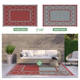 GENIMO outdoor rug on a deck pairs with furniture for a cohesive look.