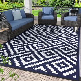 GENIMO outdoor rug 4x6 waterproof for patios and decks, easy cleaning.