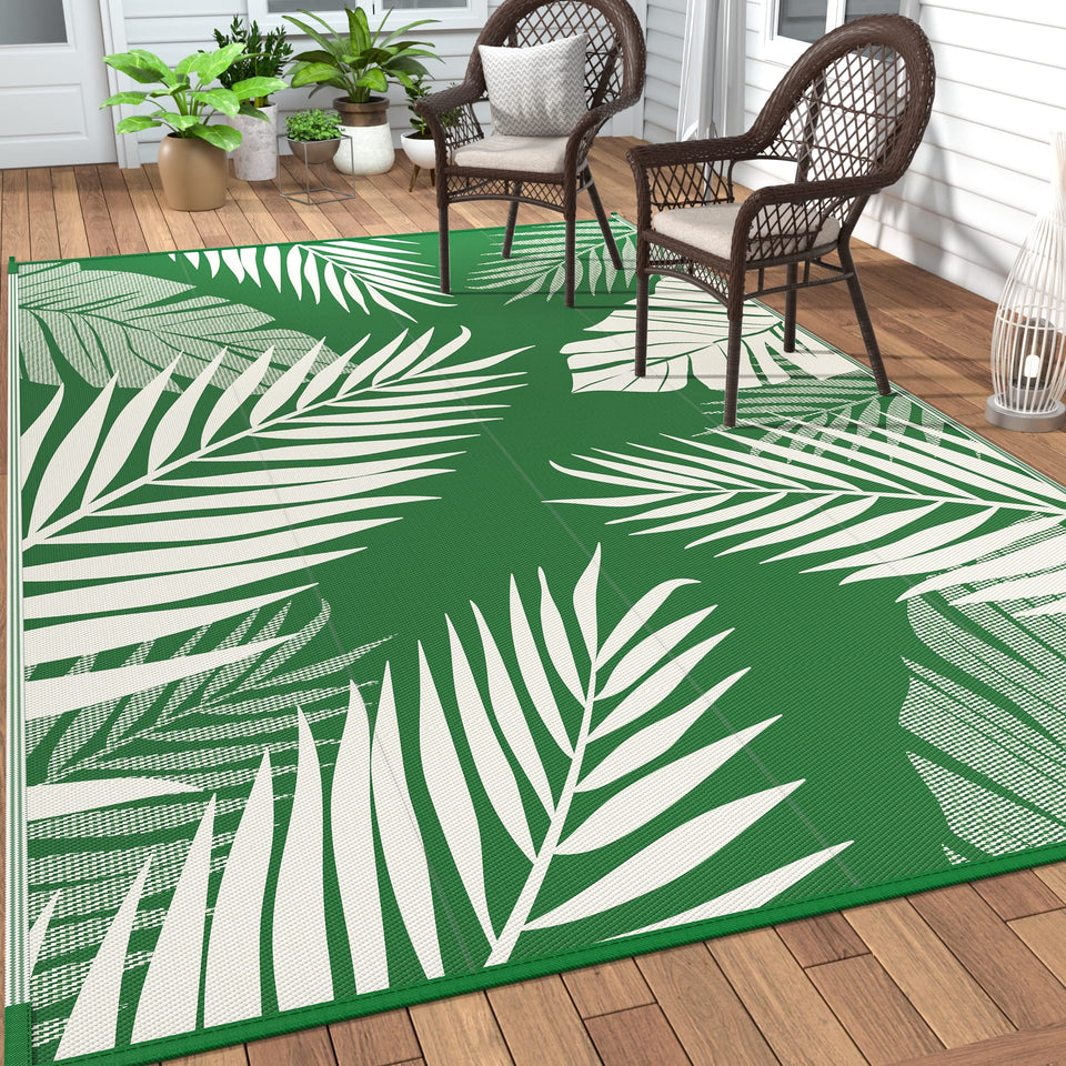 Genimo palm-leaf double-sided outdoor rug for versatile outdoor decor