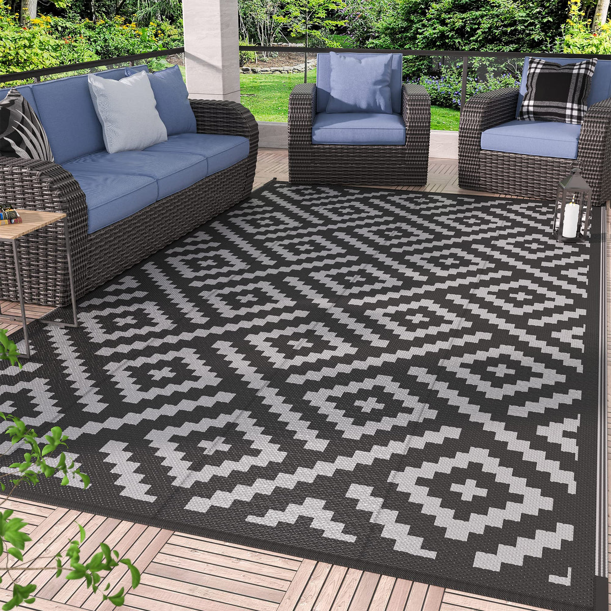 GENIMO outdoor rug on patio showcasing reversible patterns for versatile outdoor décor.