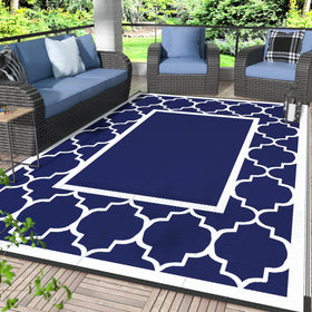GENIMO outdoor rug in blue and white pattern ideal for patio use.