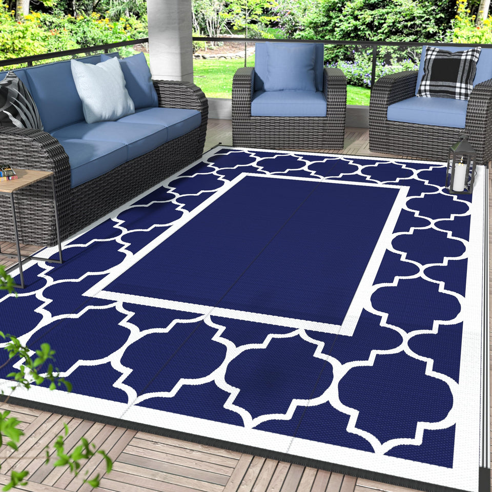 GENIMO outdoor rug in blue and white pattern ideal for patio use.