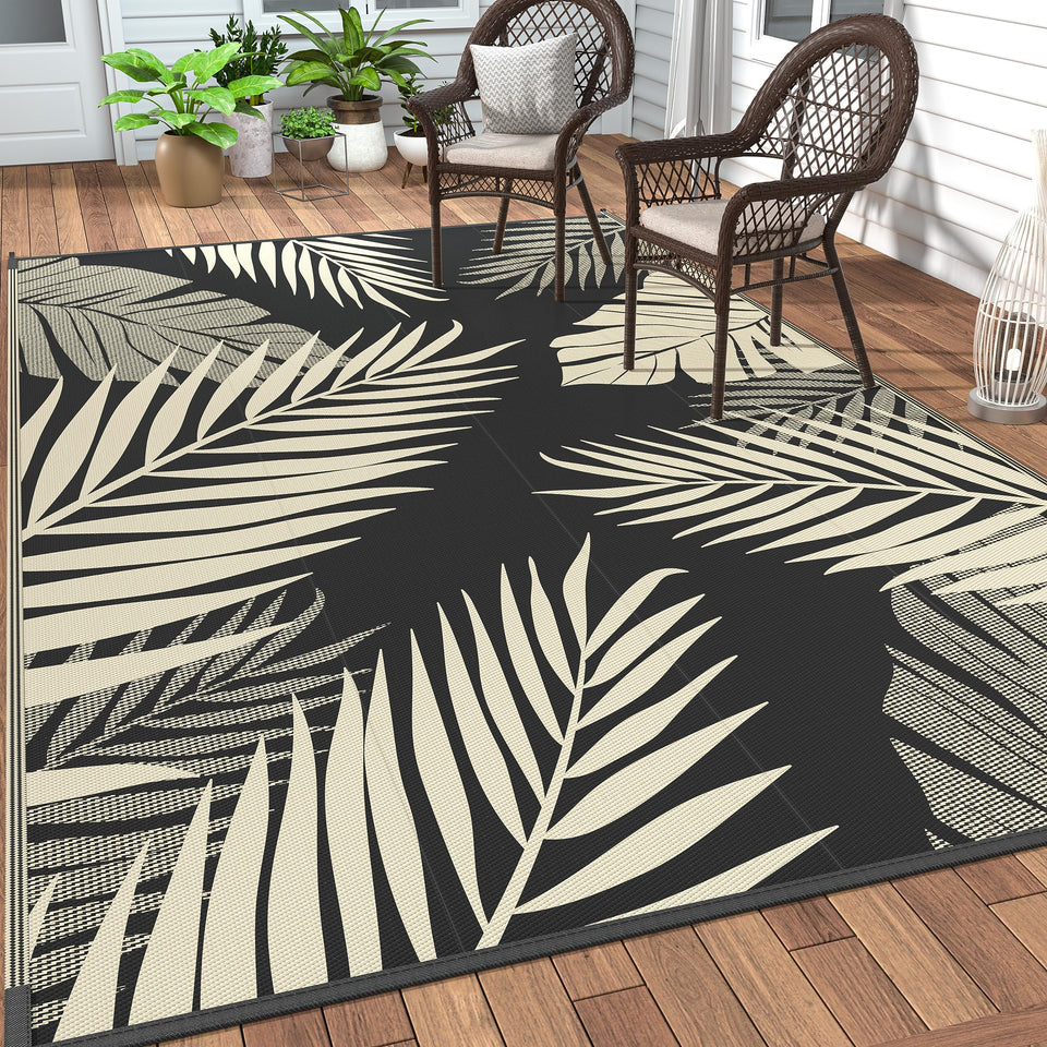 GENIMO outdoor rug with palm leaf design for stylish patio decor and outdoor comfort.