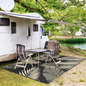 GENIMO portable outdoor rug folds for easy packing at campers and RV trips.