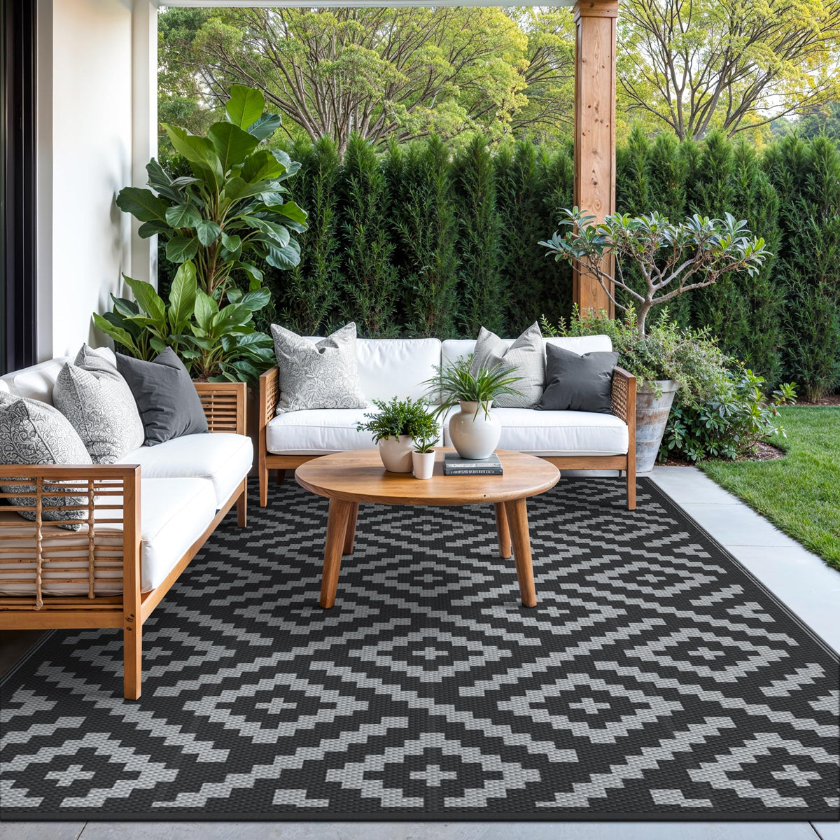 GENIMO outdoor rug rolled with carrying bag for easy transport.