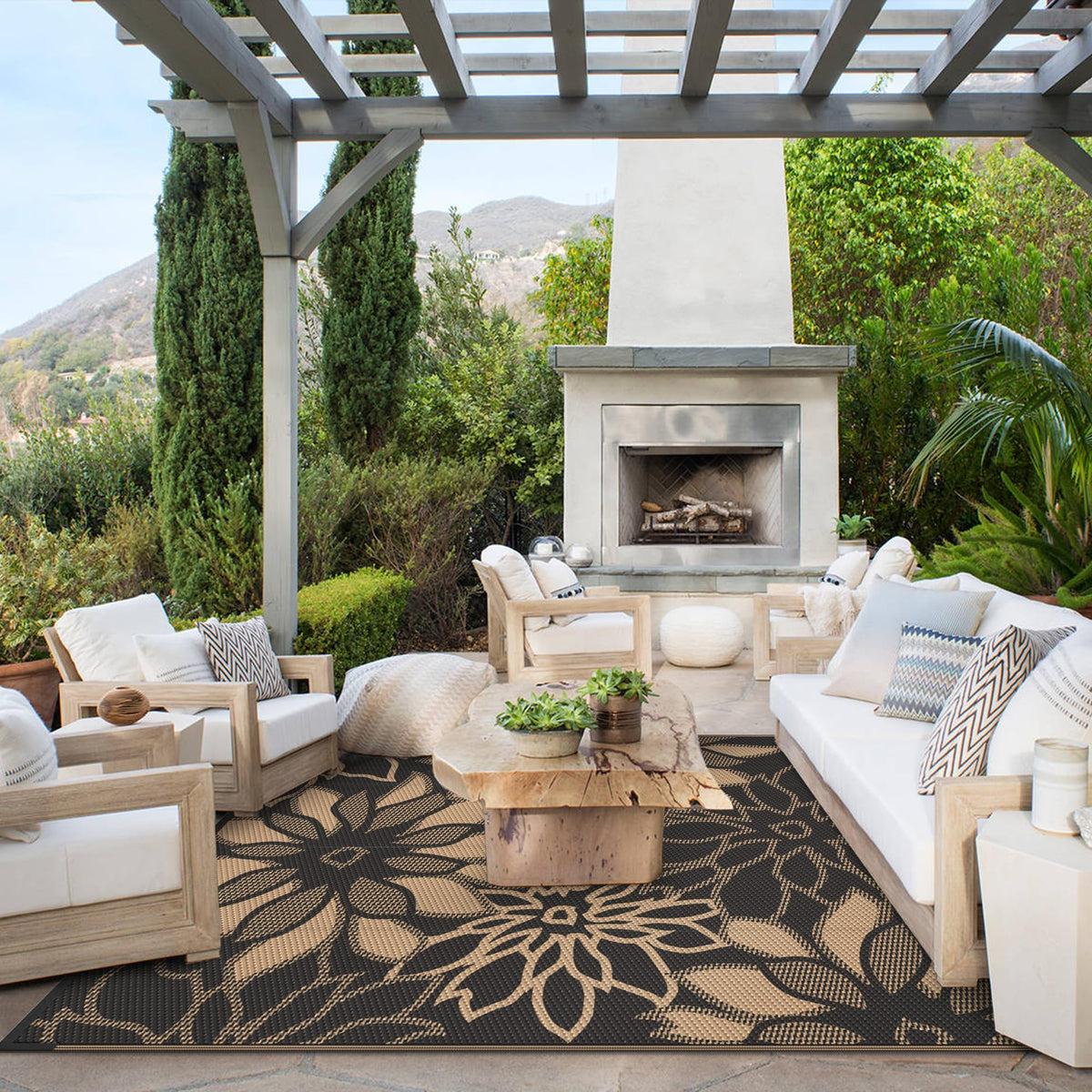 GENIMO rug two-sided floral pattern offers versatile styling to outdoor spaces.