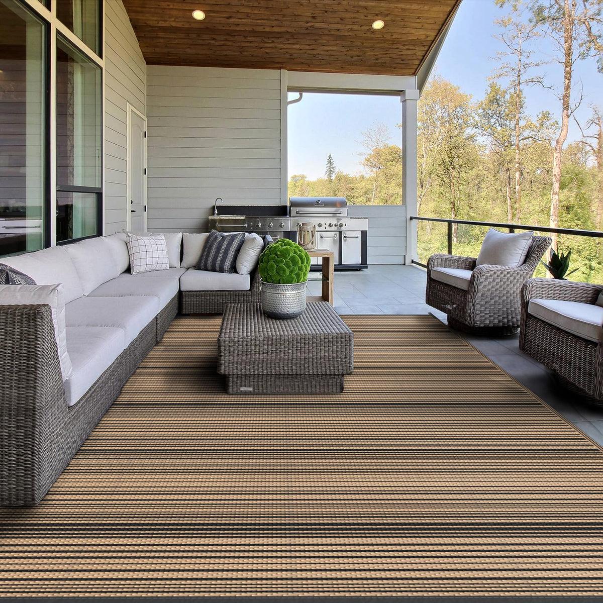 GENIMO outdoor rug showing waterproof coating for rain-ready areas.