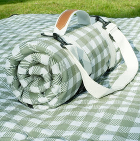 Genovega waterproof picnic blanket folded compact for easy transport.