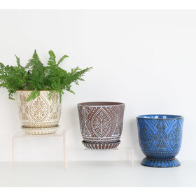 Gepege ceramic planter on a windowsill, adding minimalist elegance.