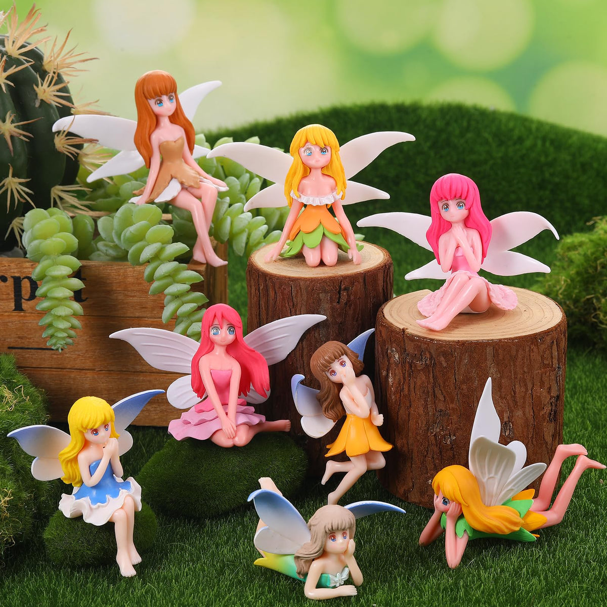 GGSTDDUP fairy figurines shown in terrarium display and moss landscape