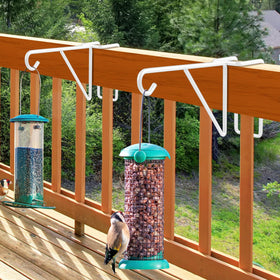 Gicare multi-use placements with lights and feeders along a fence.
