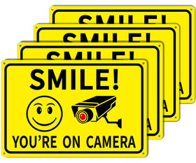 Giftape Smile You're On Camera sign clearly marks surveillance for homes