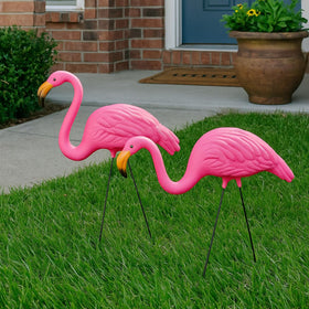GiftExpress pink flamingos in dual poses add dynamic yard charm.