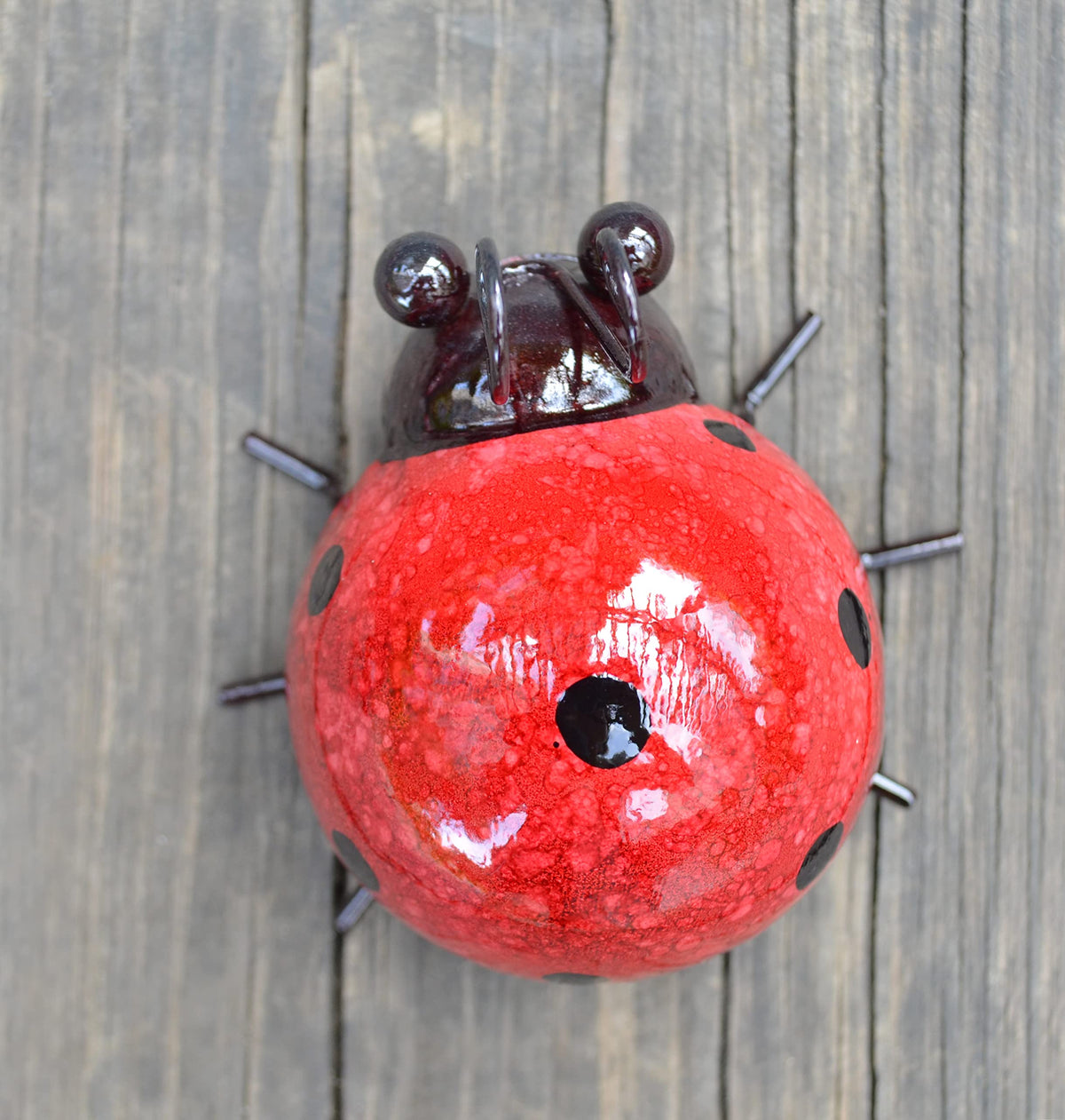 Giftme 5 outdoor decor serves as a thoughtful gift for garden lovers.