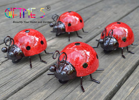 Close-up of glossy red ladybug details with waterproof coating for outdoor use.