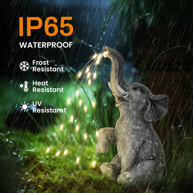 GIGALUMI elephant statue with LED lights, illuminated water flow for cozy yard lighting.