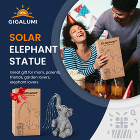 GIGALUMI elephant garden statue, side view, solar-powered lights brighten patios after sunset.