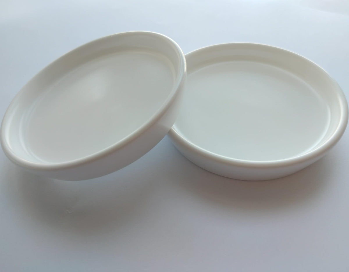 GIKUPOM plant saucer 4-inch demonstrates detailed glaze and sleek ceramic surface.