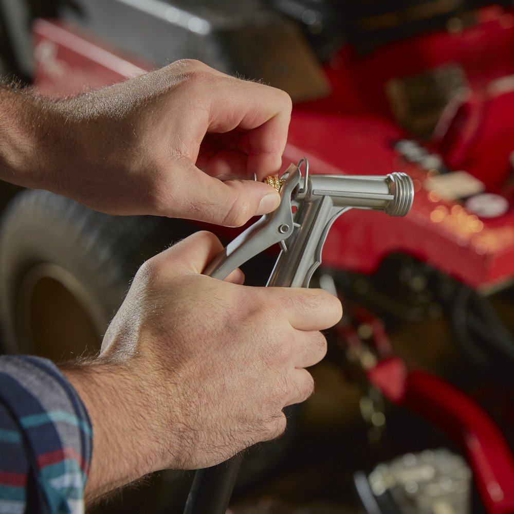 Gilmour hose nozzle handle closeup emphasizing comfortable grip and precise control.