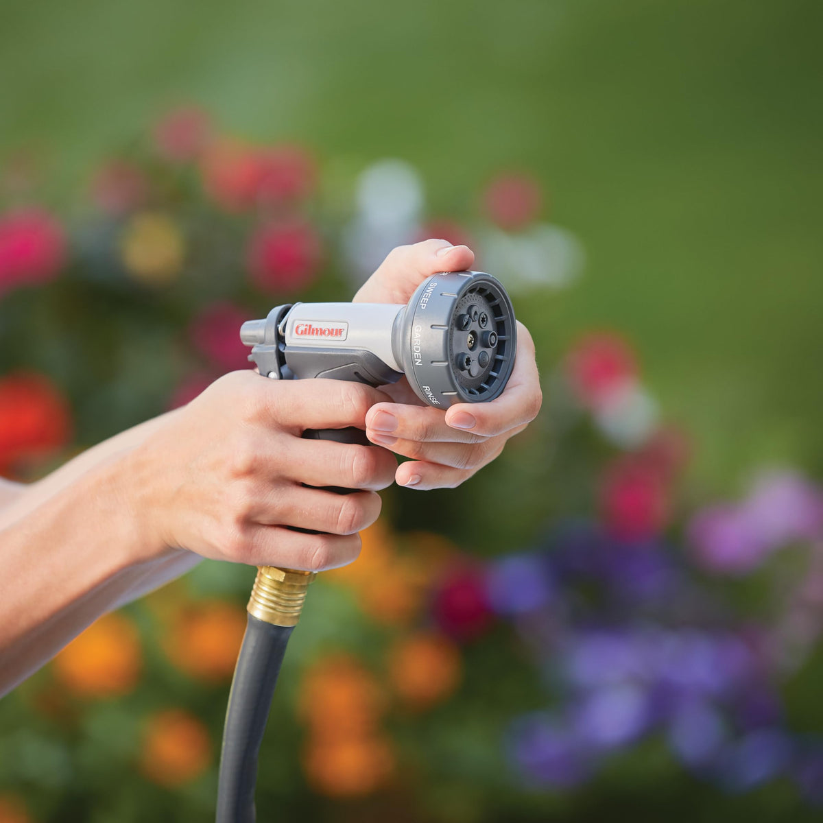 Gilmour nozzle with ergonomic handle and trigger lock for comfortable operation.