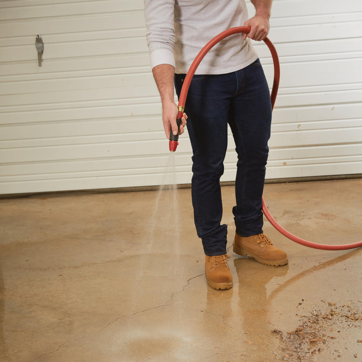 Gilmour Pro red cover enhances durability and surface-friendly performance.