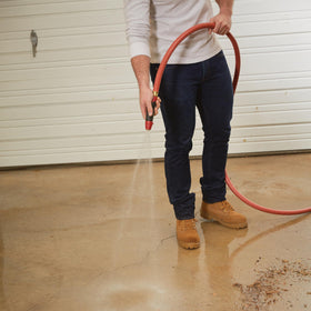 Gilmour Pro red cover enhances durability and surface-friendly performance.