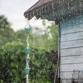 giole green finish rain chain repels fading and weathering on gutters.