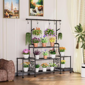 GIOTORENT stand with five hanging hooks supports cascading trailing plants.