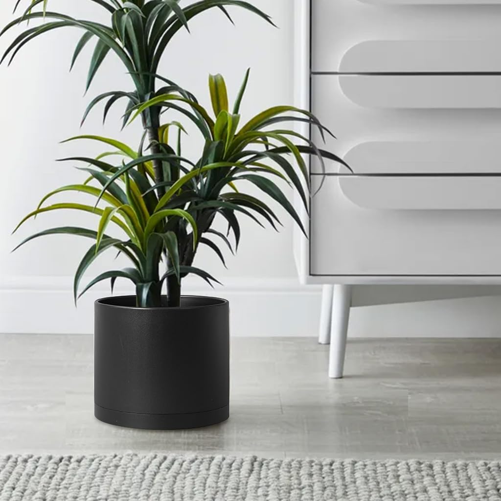 Giraffe Creation black round planter fits modern décor and versatile spaces.