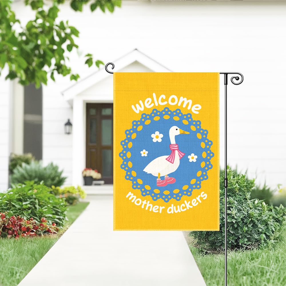 Gkodw flag displayed in a garden setting, welcoming ambiance for porch and yard