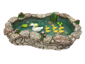 GlitZGlam miniature pond scene with lotus and frog beautifies fairy gardens