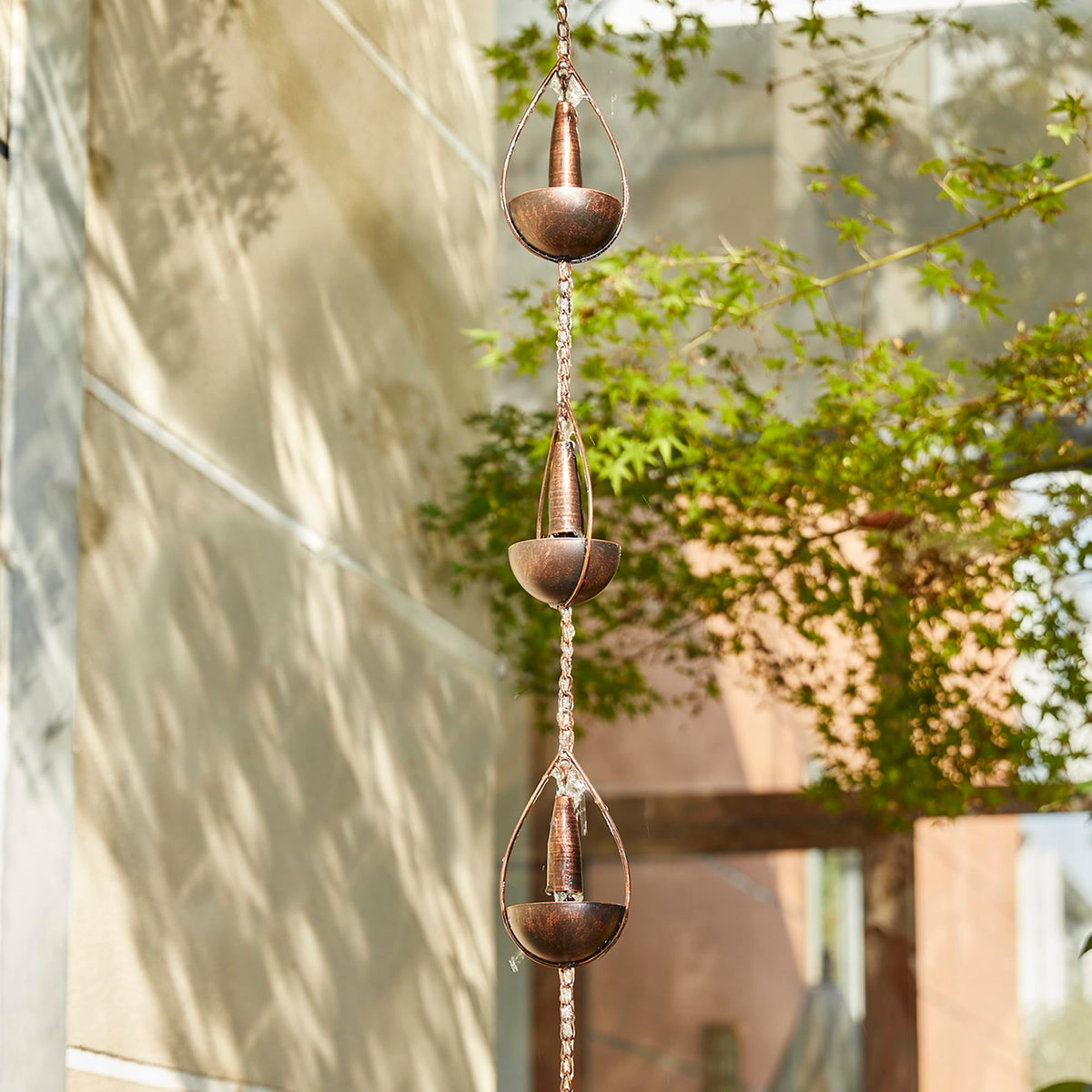 Glitzhome garden display - rainwater flows through bowls into the ground