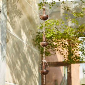 Glitzhome garden display - rainwater flows through bowls into the ground