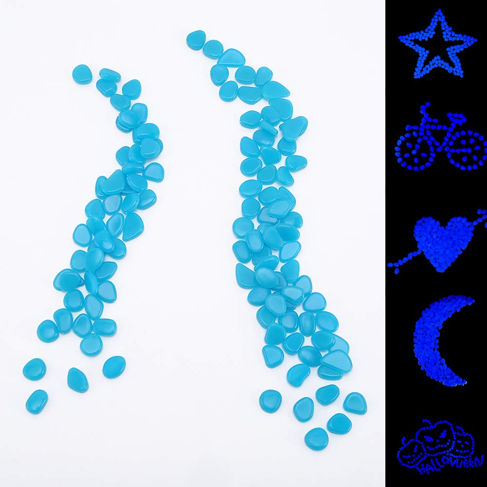 GLOCARNIVAL Glow Pebbles illuminate a water feature with blue glow