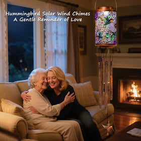 Go2garden backyard ambience with a hummingbird lantern invites quiet evenings outside.