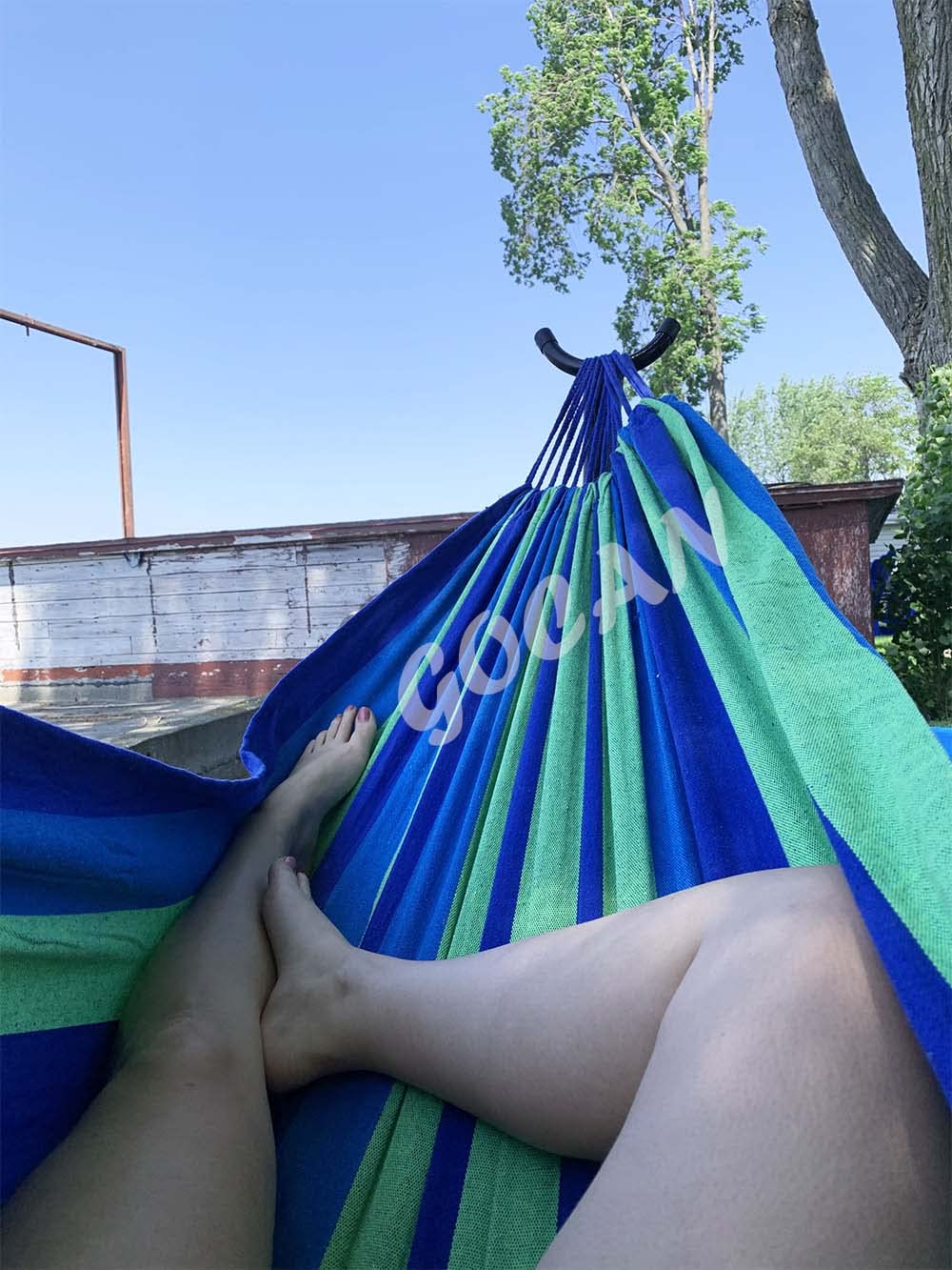 GOCAN hammock set up for indoor or outdoor spaces like patios and gardens.