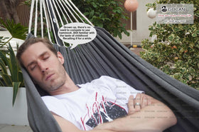 Two-person lounging on a GOCAN hammock, ideal for balcony or patio.
