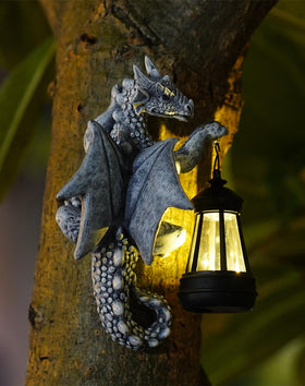 Goodeco Dragon Tree Hugger lantern glows softly to light outdoor evenings.