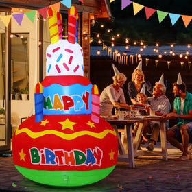 Goosh birthday cake inflatable showing candle tops and LED rotation for festive ambiance.