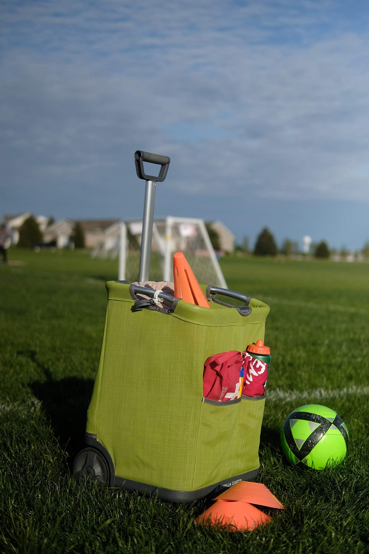 Gorilla Carts GCSS-11G-COM over-molded rubber wheels on varied terrain
